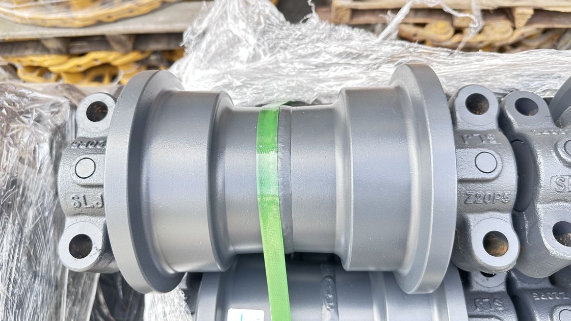 Sk200 Части экскаватора под шасси Части трассы сцепления трассы обуви трассы роллеры верхние нижние роллеры Sprokcet Idler